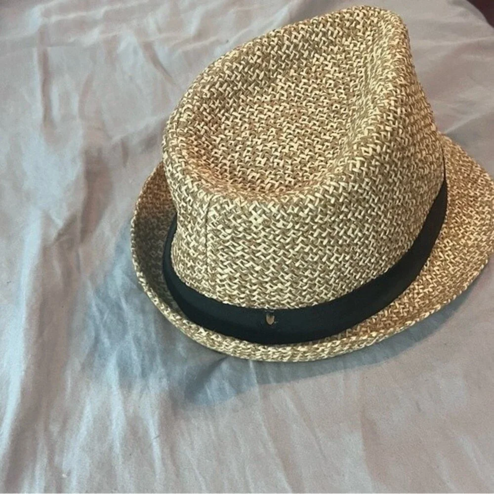 Woman’s black banded straw fedora hat